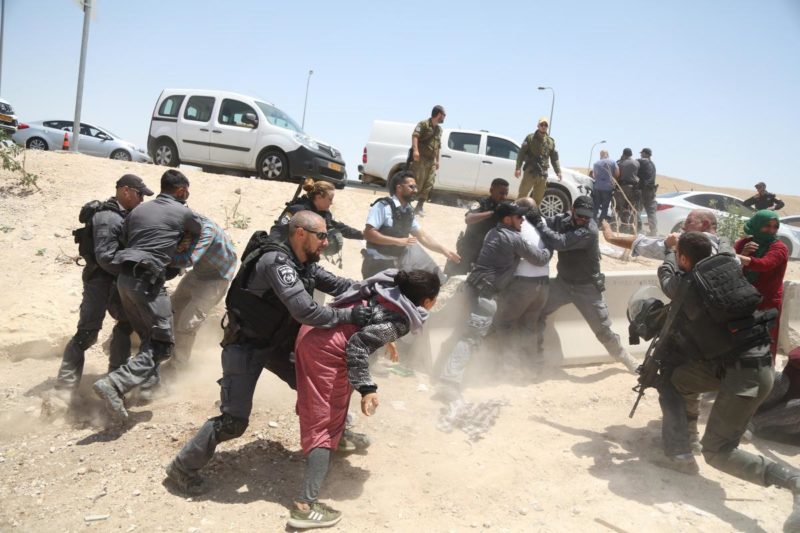 Israeli forces fighting with Palestinians opposing eviction.